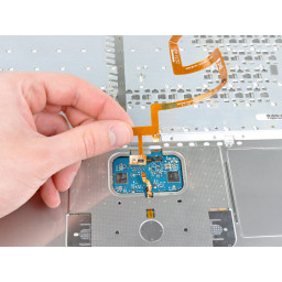 Замена кабеля верхнего корпуса MacBook Core Duo